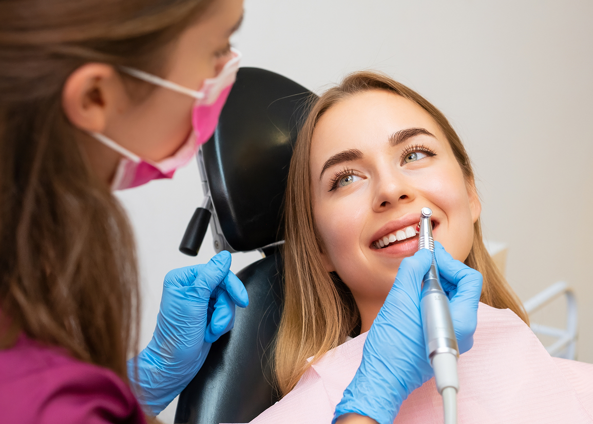 Dr. Andrew Gobran providing dental cleaning and examination