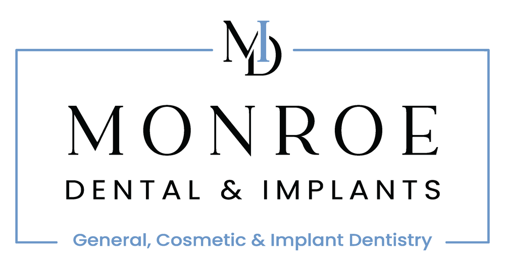 Monroe Dental & Implants logo